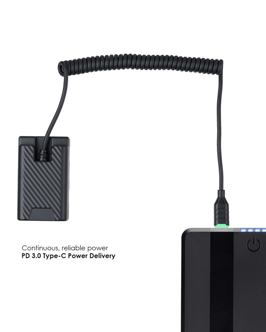 POWRIG Type-C to BP-U dummy battery power cable plugged into PD 3.0 power bank with green LED power indicator illuminated