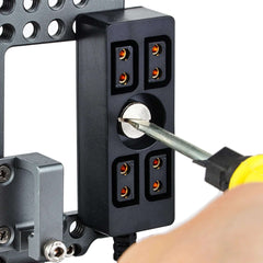 D-Tap 4-Way Splitter Mounted on Camera Cage with 1/4 Screw Fixing