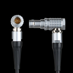 Close-up of gold-plated 5-Pin Lemo connector on Ambient timecode cable, secure connection for Arri cameras