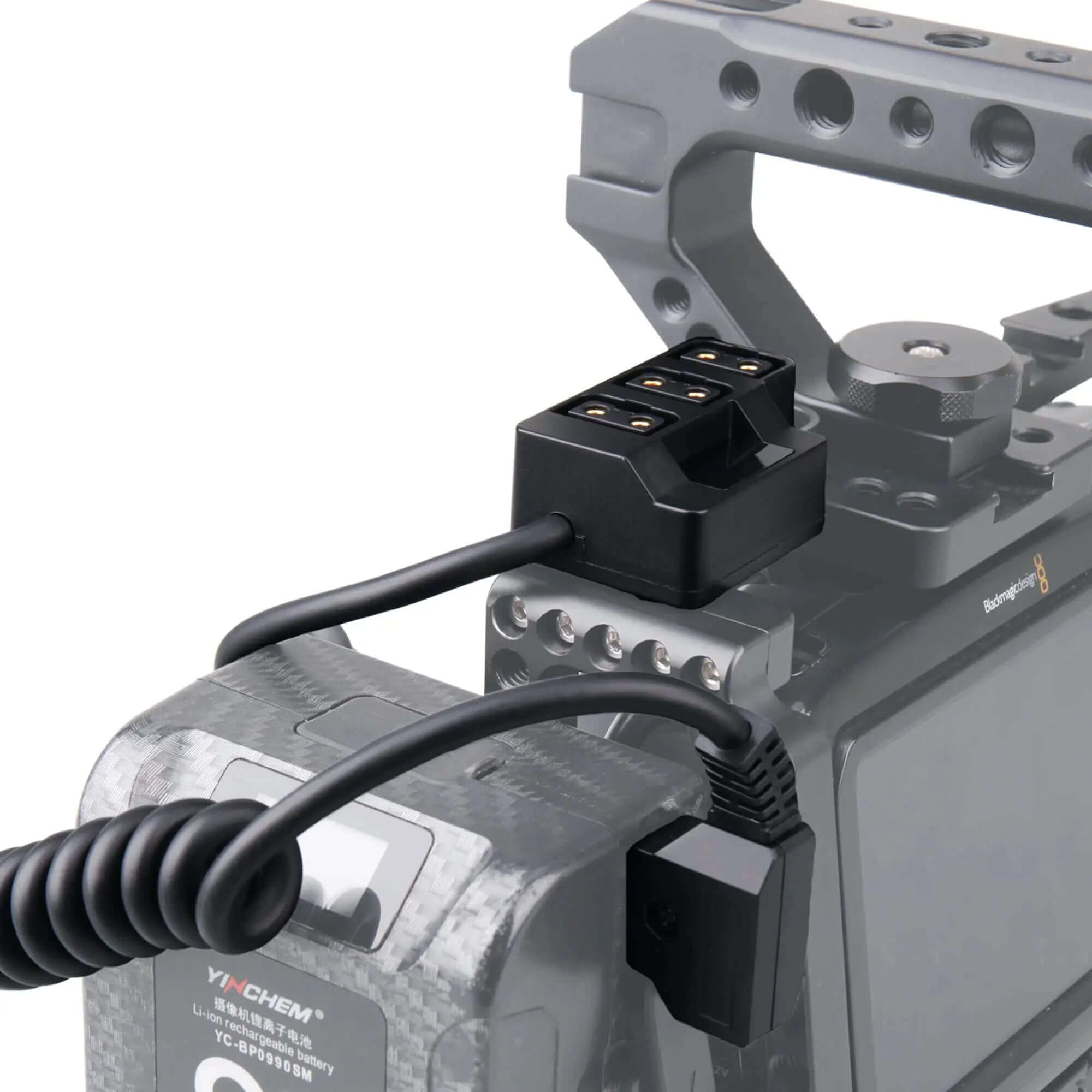 D-Tap power splitter and coiled cable in use on a professional Blackmagic camera rig for external power distribution