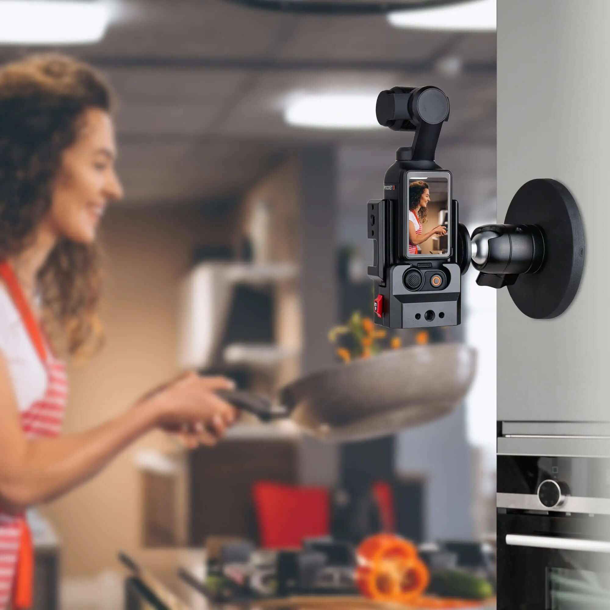POWRIG magnetic mount holding DJI Osmo Pocket 3 vertically on a refrigerator to record a cooking vlog tutorial