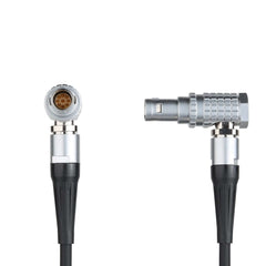 Close-up of gold-plated LEMO connector on UltraSync One timecode cable, secure connection for RED Komodo